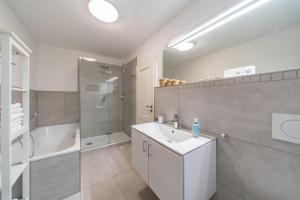 Vannituba majutusasutuses NordseeResort Friesland NordseeResort Friesland 30 +20 fotot