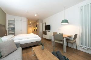 Giường trong phòng chung tại Apartmentvilla Anna See Apartmentvilla Anna See 1-06