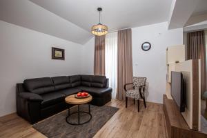 Posezení v ubytování Rest Apartments