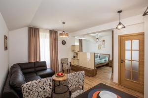 Posezení v ubytování Rest Apartments