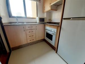 Kuchyň nebo kuchyňský kout v ubytování gemelos 4 playa levante