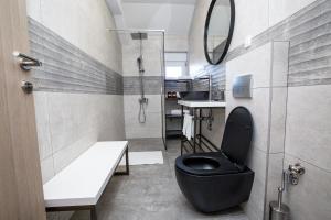 Kuchyň nebo kuchyňský kout v ubytování Rest Apartments