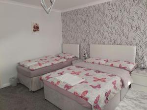 Postel nebo postele na pokoji v ubytování Home accommodation