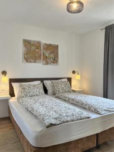 Postel nebo postele na pokoji v ubytování Apartment Lorun 47