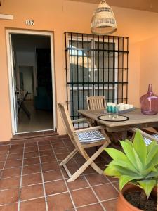 Posedenie v ubytovaní Apartamento Residencial Al Andalus 117, La Barrosa, Chiclana, Incluye parking a unos metros del mar