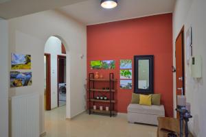 A seating area at Mpoulakis Apt 98