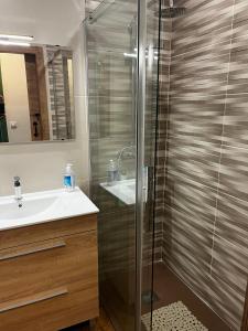 a bathroom with a shower and a sink at Casa Rural Chincha in Tragacete +57 photos