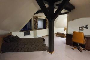 Кровать или кровати в номере Beautiful house with fireplace in the most unique place in Latvia