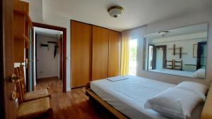 Posteľ alebo postele v izbe v ubytovaní PANORAMIC apartment