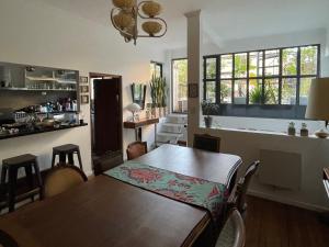 a kitchen and dining room with a table and chairs at Le Petit Palais in Buenos Aires