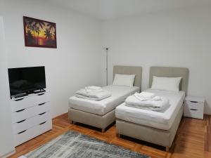 Postel nebo postele na pokoji v ubytování Apartman Radulović