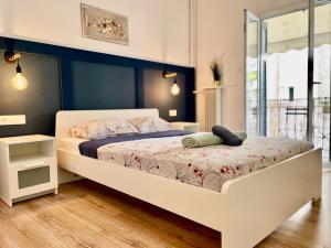 A bed or beds in a room at B&B Boutique Two Bedrooms Apartments