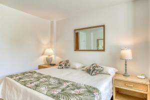 Ένα ή περισσότερα κρεβάτια σε δωμάτιο στο Ilikai 883