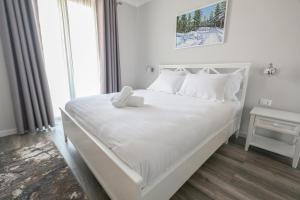 Postel nebo postele na pokoji v ubytování Hotel Peroni