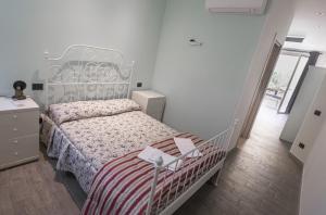 Postel nebo postele na pokoji v ubytování AFFITTACAMERE SCIACCHETRA'