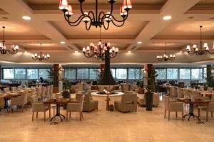 A restaurant or other place to eat at RAW BEACH HOTEL