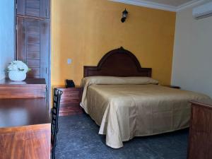 Katil atau katil-katil dalam bilik di Hotel Delicias Tequila