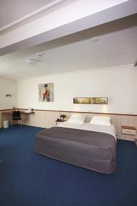 Katil atau katil-katil dalam bilik di Hotel Princenhof