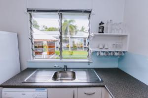 A kitchen or kitchenette at Kooyong Apartment 6