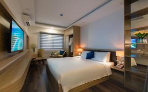 Giường trong phòng chung tại Holi Anna +60 ảnh