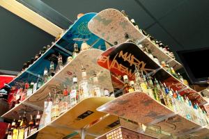 a group of skateboards on top of a bar at Sundance Lodge in Sun Peaks