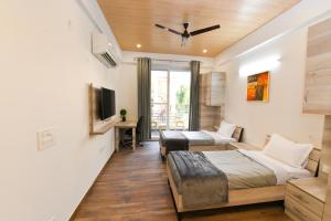 Postel nebo postele na pokoji v ubytování Stay Studio Hotel & Residences