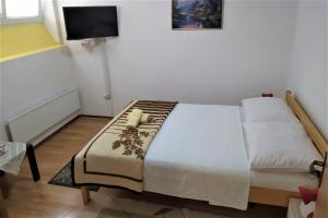 Postel nebo postele na pokoji v ubytování Studio Apartment Mara Zagreb - Happy Rentals