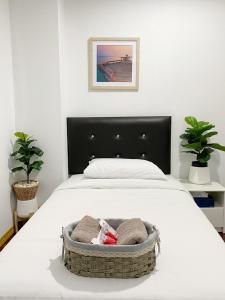 Postel nebo postele na pokoji v ubytování Boxsoon Nimman 2