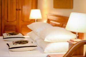Letto o letti in una camera di Hotel Casamara