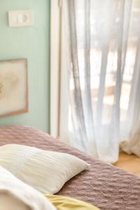 Un pat sau paturi într-o cameră la Agia Markella