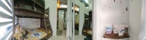 two mirrors in a room with a shelf with someones reflection at Cool at Wind Residences Tagaytay with FREE Use of Parking Space at Basement Building in Tagaytay +50 photos