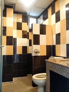 Ванная комната в โรงแรมวิจิตรพร อุบล VJP Hotel Ubon