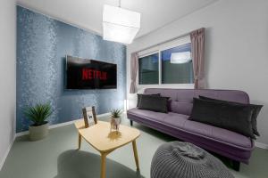 THE SECRETにあるテレビまたはエンターテインメントセンター