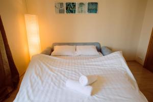 Cama o camas de una habitación en ApartLux on Krasnaya Presnya