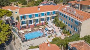 an aerial view of a hotel with a swimming pool at Agia Markella in Chios