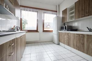 Köök või kööginurk majutusasutuses Hotel Sklárna Harrachov