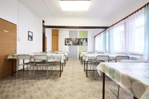 Voodi või voodid majutusasutuse Hotel Sklárna Harrachov toas