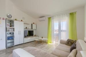 TV a/nebo společenská místnost v ubytování Apartment Marija