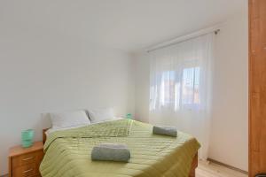 Postel nebo postele na pokoji v ubytování Apartment Marija