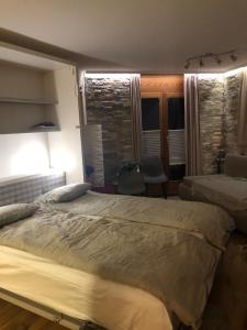Postel nebo postele na pokoji v ubytování Nido Alpino Fiescheralp + 19 fotografií