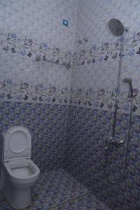 Koupelna v ubytování Madhav Mansion Beach Resort