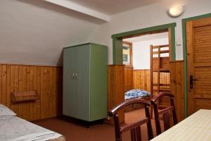 Posteľ alebo postele v izbe v ubytovaní Chata Šumava