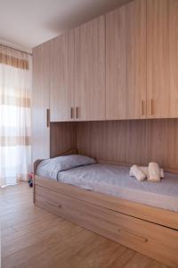 Posteľ alebo postele v izbe v ubytovaní Airone Residence