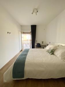 Cama ou camas em um quarto em Casa Giulia