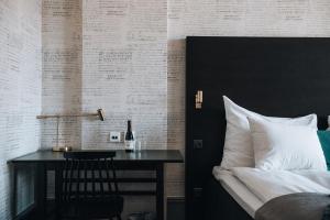 Postel nebo postele na pokoji v ubytování Clarion Hotel Wisby