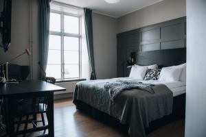 Postel nebo postele na pokoji v ubytování Clarion Hotel Wisby