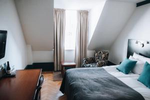Postel nebo postele na pokoji v ubytování Clarion Hotel Wisby