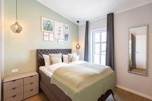 Katil atau katil-katil dalam bilik di Quartier Frohsinn App 12