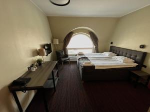 Postel nebo postele na pokoji v ubytování Braavo Spa Hotel + 37 fotografií