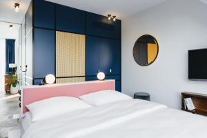 Letto o letti in una camera di Hotel Gilbert